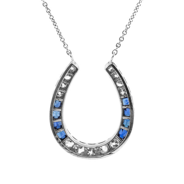 N495-2-Horseshoe-Diamond-Sapphire-Platinum